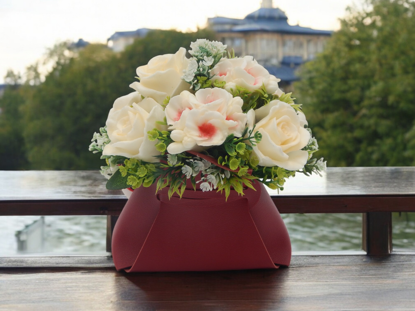 White Roses in Red Bag