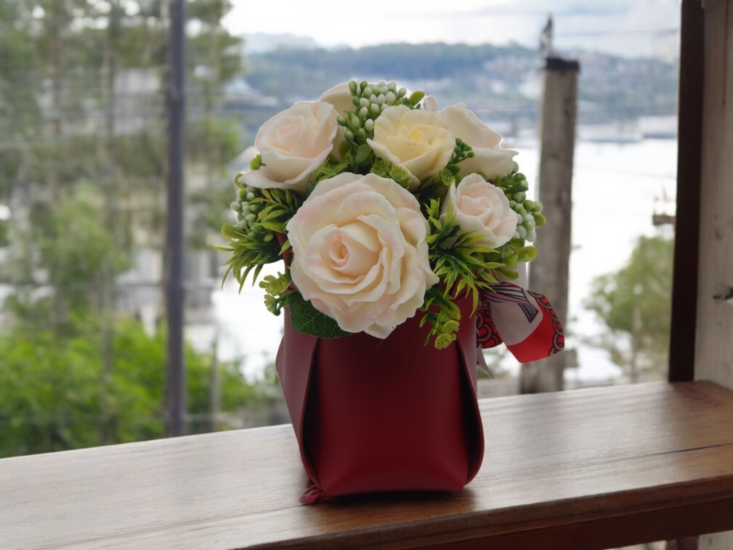 White Roses in Red Bag