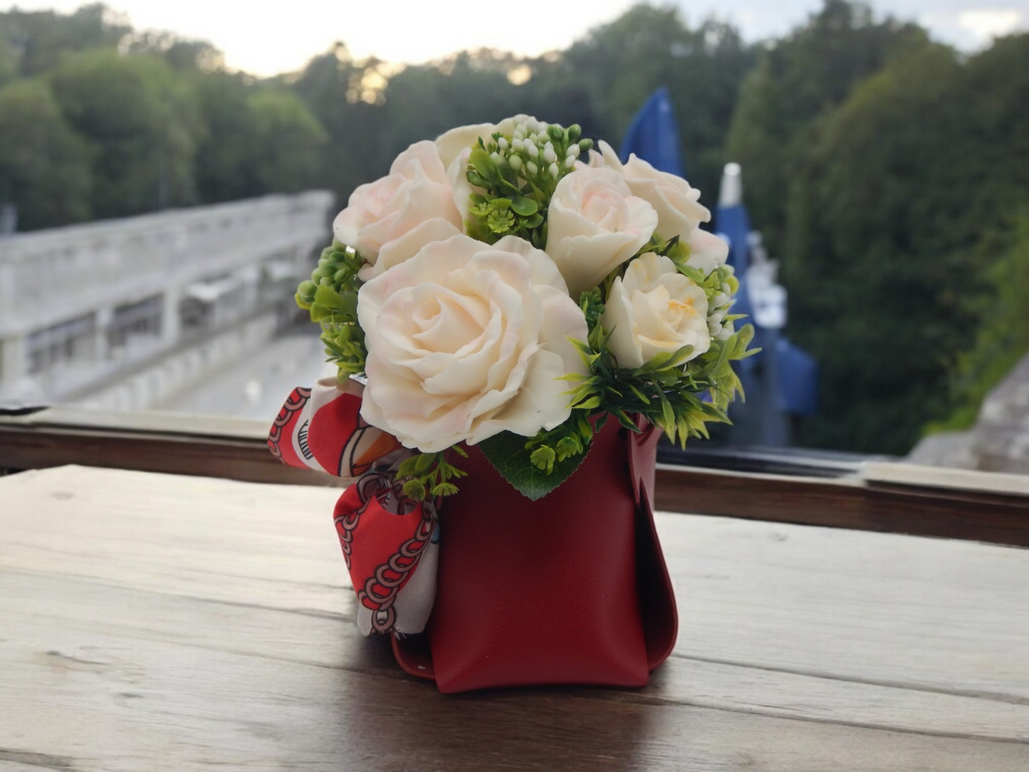 White Roses in Red Bag